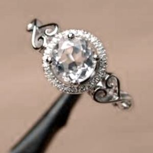 White topaz halo engagement ring